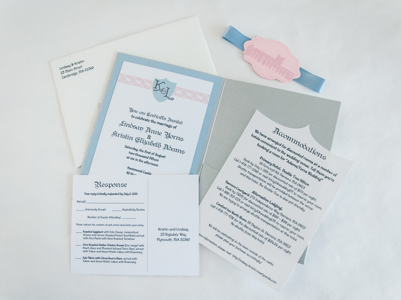 The custom shape of the accommodations card echoes the shape of the monogram crest on the invitation.