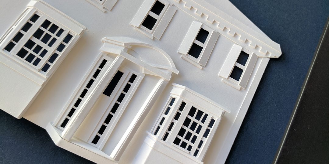 a model of a house with windows and doors