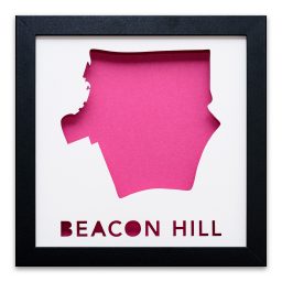 a pink paper cut out of the shape of beacon hill