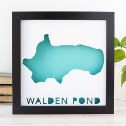 a black frame with a blue map of wales