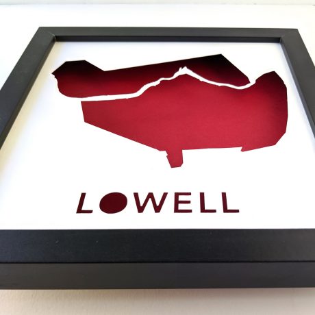 a red and black framed artwork with the words lowell
