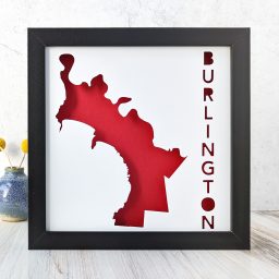 a red and white framed map of Burlington, VT